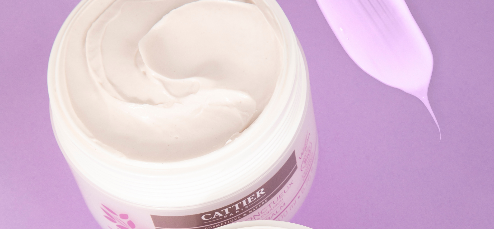 Visuel d'un pot du baume corps onctueux Cattier ouvert avec la texture visible